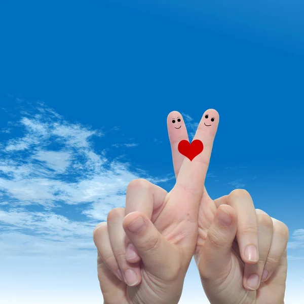 Dois dedos pintados com um coração vermelho — Fotografia de Stock