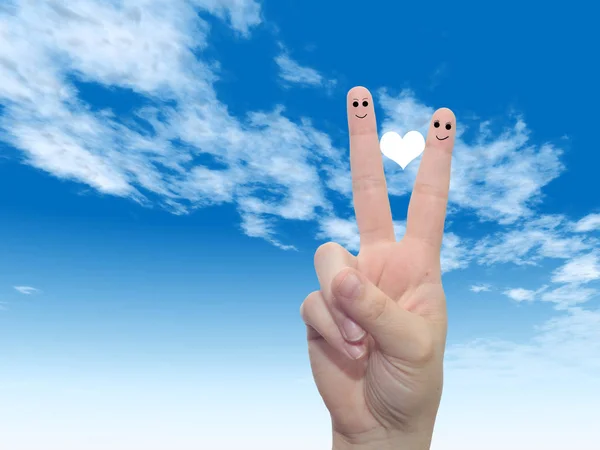 Fingers with red heart and smiley faces — Stock Photo, Image