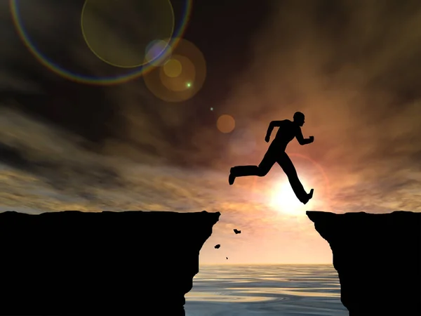 Young man silhouette jump from cliff — Stock Photo, Image