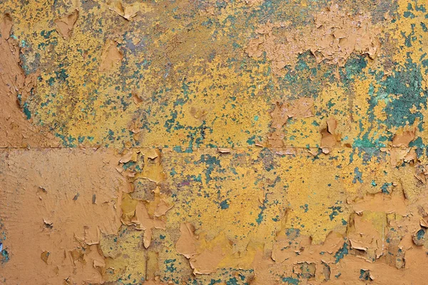 Orange brown old rusted corroded metal or steel sheet horizontal wall background as abstract dirty textured metallic vintage industrial closeup for retro grungy surface design. A rough iron aged plate