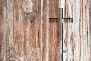 Kahverengi eski Hıristiyan din sembol inanç bir grungy dokulu kilise duvar veya rustik arka plan veya zemin üzerinde işareti olarak şekli alan kavramsal maneviyat veya diriliş tasarım kopyalama