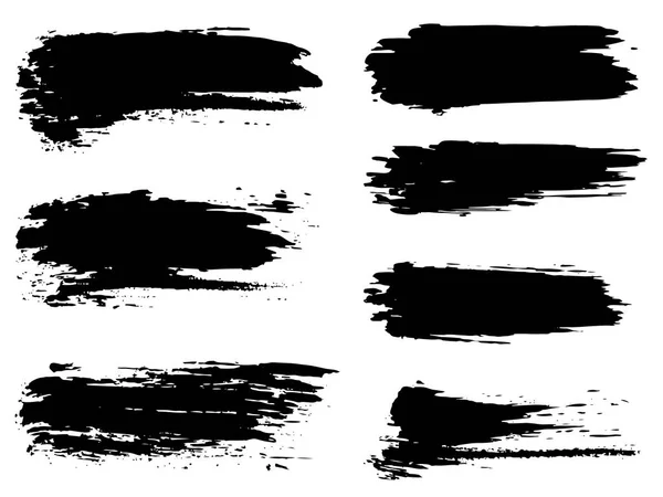 Collection of grungy black paint strokes — Stock Vector