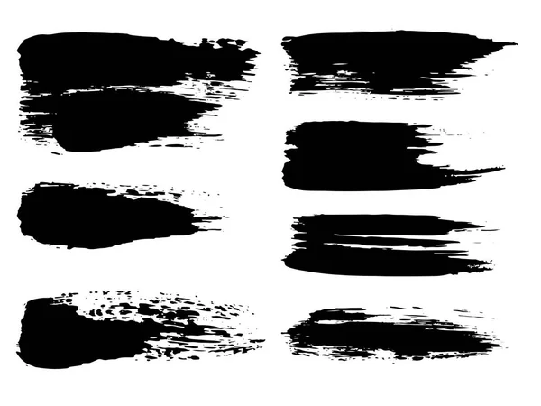 Collection of grungy black paint strokes — Stock Vector
