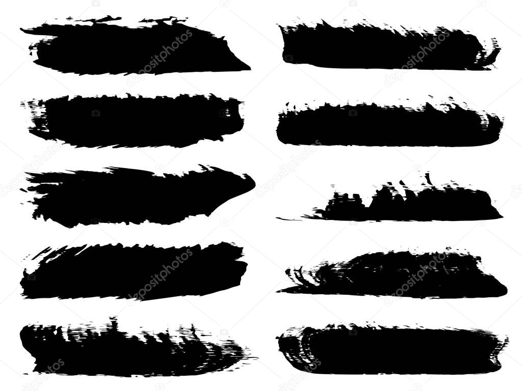Set of artistic grungy black paint hand made creative brush strokes isolated on white.