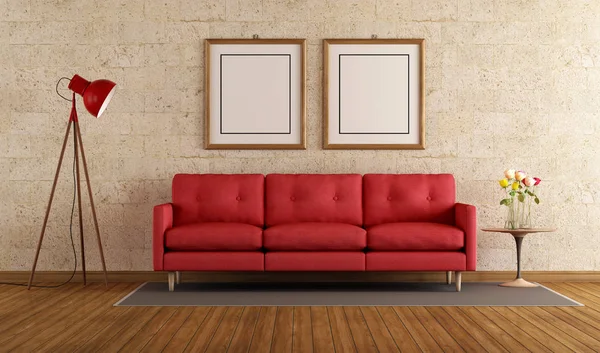 Sofá rojo en un salón —  Fotos de Stock