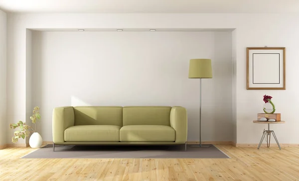 Белая комната с зеленым диваном — стоковое фото