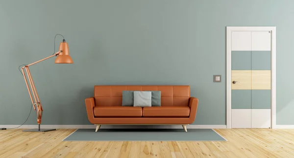 Blaues Wohnzimmer mit orangefarbenem Sofa — Stockfoto