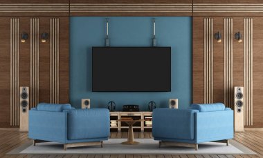 Mavi duvarda asılı Tv ile ev sinema salonu