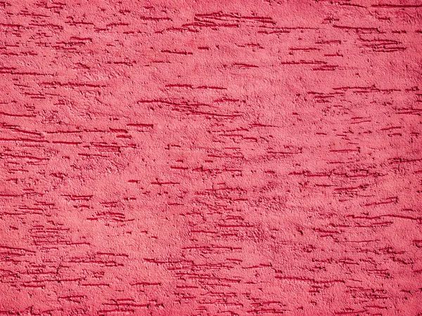 Détail d'un mur extérieur rouge texturé — Photo