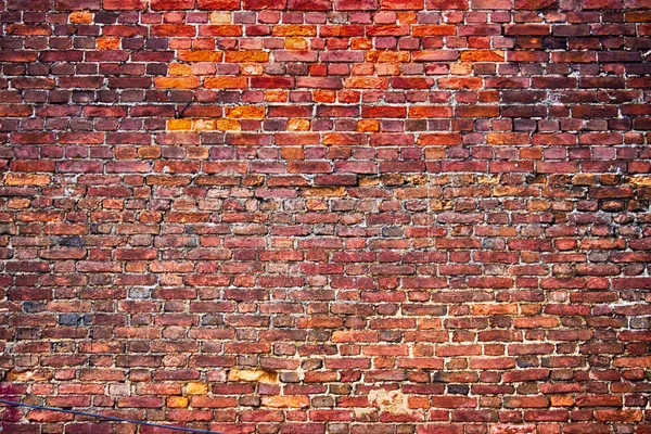 Antigua pared de ladrillo textura vintage de bloques de piedra roja como backgr — Foto de Stock