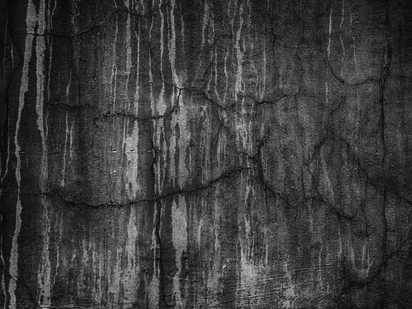 ひび割れテクスチャ背景の黒い壁 — ストック写真