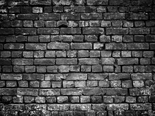 Oude zwarte bakstenen muur, stenen bitmappatroon voor achtergrondontwerp — Stockfoto