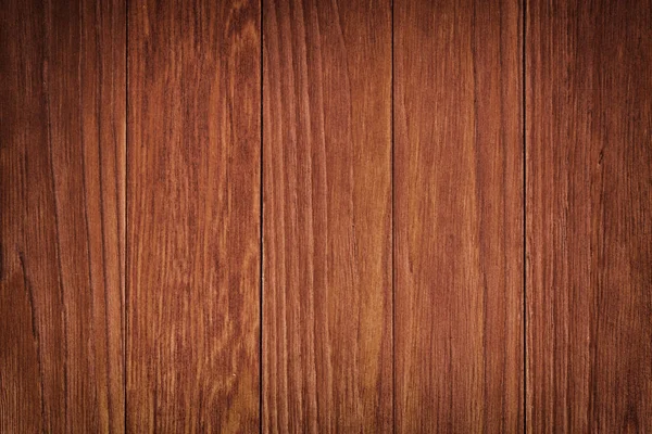 Tmavě hnědá poškrábaná dřevěná řezací deska. Struktura dřeva — Stock fotografie