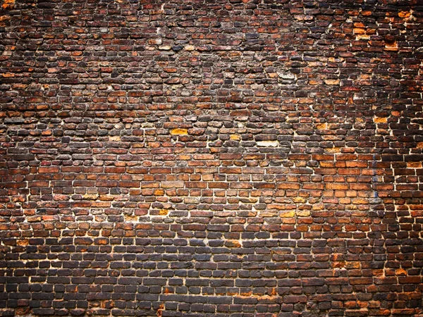 Brick wall as background, weathered surface with a vintage effec — Stock Photo, Image