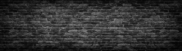 Black brick wall panoramic background for design — Stock Photo, Image