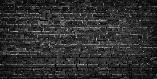 Dark brick wall as a backdrop. brickwork design element — Stock Photo, Image