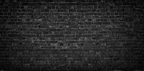 Dark brick wall as a backdrop. brickwork design element — Stock Photo, Image