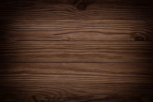 Темно-коричневая поцарапанная деревянная доска. Текстура дерева — стоковое фото