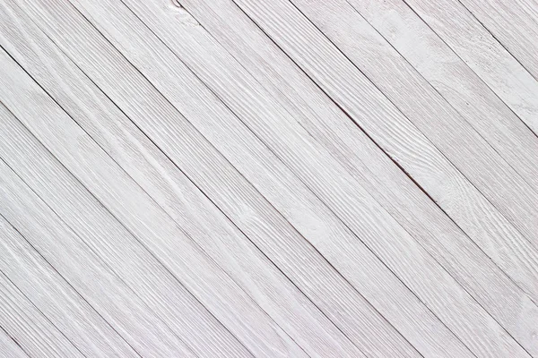 Weiß lackierte Bretter, die helle Holzoberfläche im Hintergrund — Stockfoto