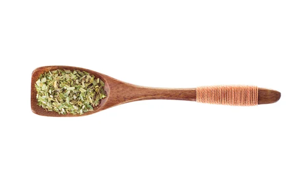 Spice dried oregano in  wooden spoon isolated on a white backgro — Stock Photo, Image