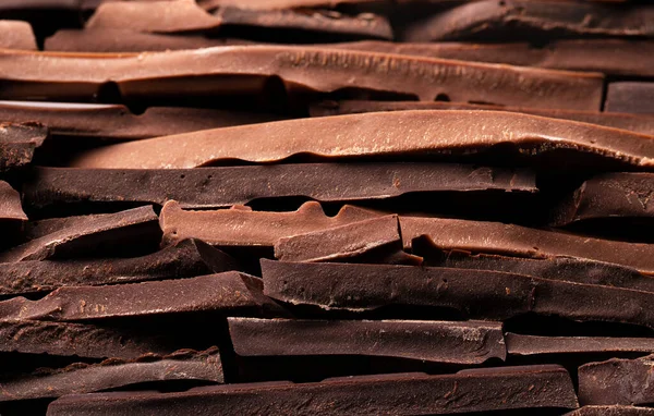 チョコレートの背景甘いデザート有機食品の山 — ストック写真