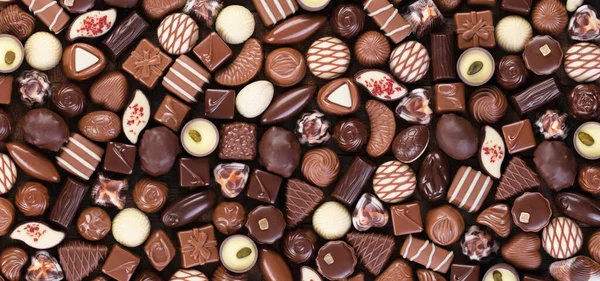 Rozmanité Sladké Jídlo Čokoládové Lanýže Cukroví Pozadí — Stock fotografie