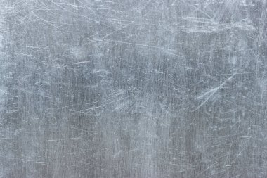 Arkaplan olarak metal yapının bir parçası olan fırçalanmış çelik dokusu