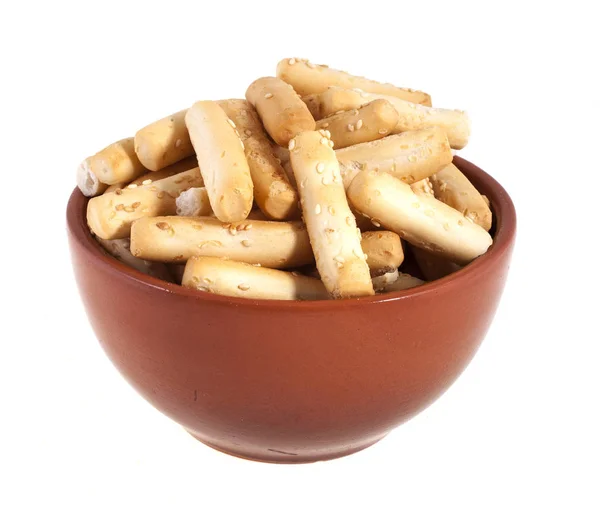 Cookies "sticks" in a brown bowl, isolated on white background — Stock Photo, Image