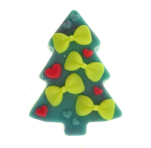 Handmade soap in the shape of a Christmas tree on a white background — Stock Photo, Image