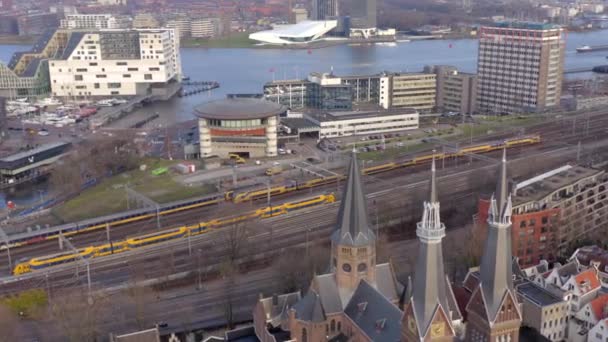Trains Arriving Departing Amsterdam Centraal Station Evening Aerial — Stock Video