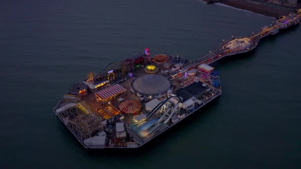 Brighton Seafront Pier Illuminated Night Aerial View — Stock Video