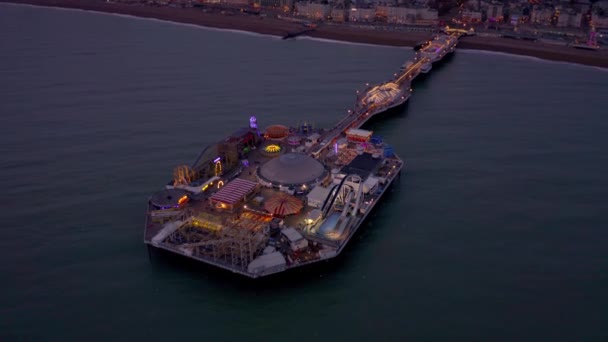 Brighton Seafront Pier Illuminated Night Aerial View — Stock Video
