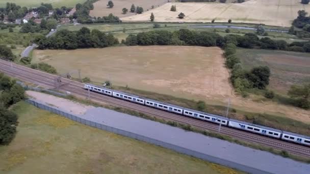 Two Commuter Trains Passing Country — Stock Video