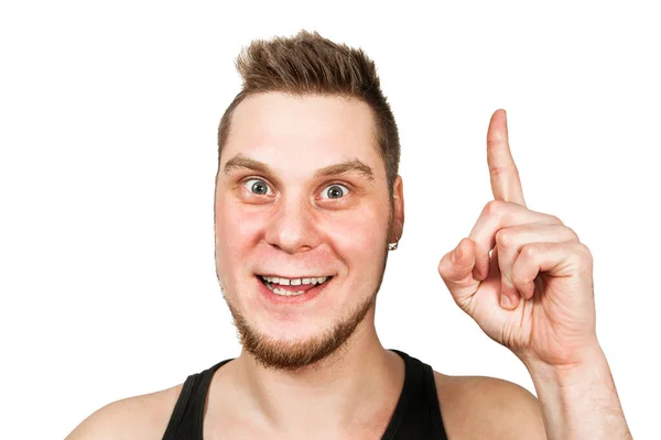 Junger bärtiger Typ mit einer Idee im Kopf, gekleidet in ein schwarzes T-Shirt zeigt den Finger nach oben isoliert auf weißem Hintergrund. — Stockfoto