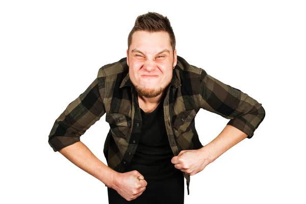 Young guy with beard and constipation defecates pushing on the toilet isolated on white background. — Stock Photo, Image