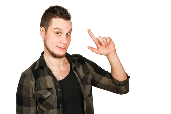 Jovem cara com barba um mostra dedo para cima isolado no fundo branco . — Fotografia de Stock