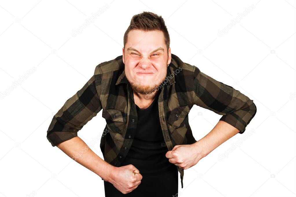 Young guy with beard and constipation defecates pushing on the toilet isolated on white background.