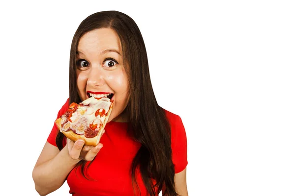 Young beautiful woman eats pizza and smiles, isolated on white background — Stock Photo, Image