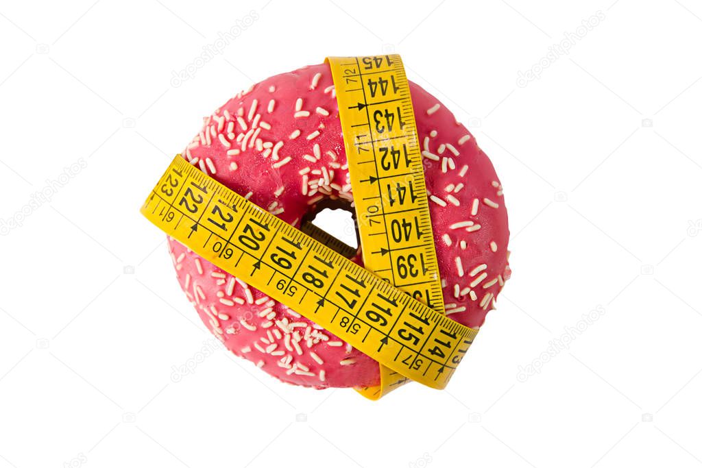 Pink donut wrapped in a measuring tape isolated on white background