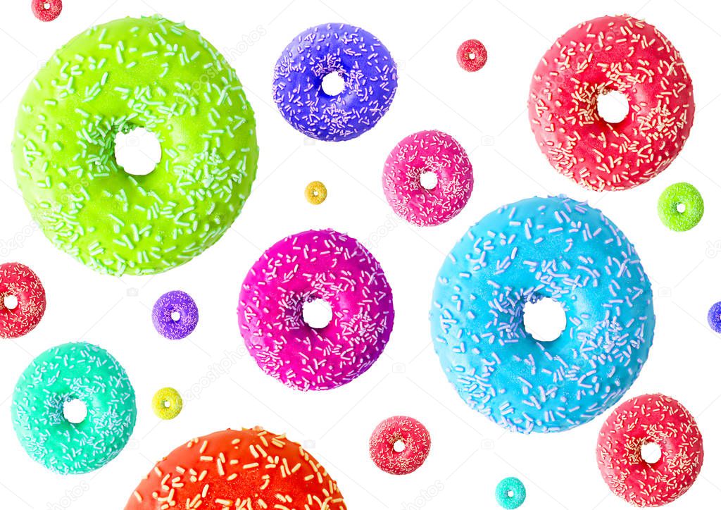 Multicolored donuts isolated on white background. Top view.