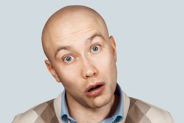 Portrait of a bald stupid surprised guy with open mouth — Stock Photo, Image