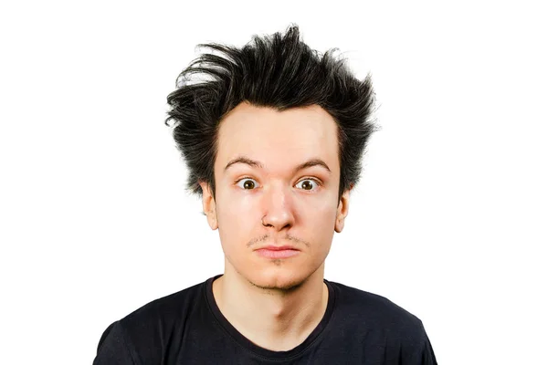 Shaggy guy with long hair looks in camera, on isolated white background. — Stock Photo, Image