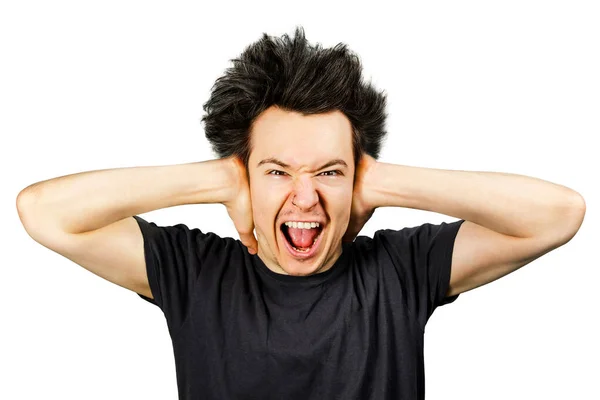 Long hair guy close his ears from the noise on a white isolated background — Stock Photo, Image