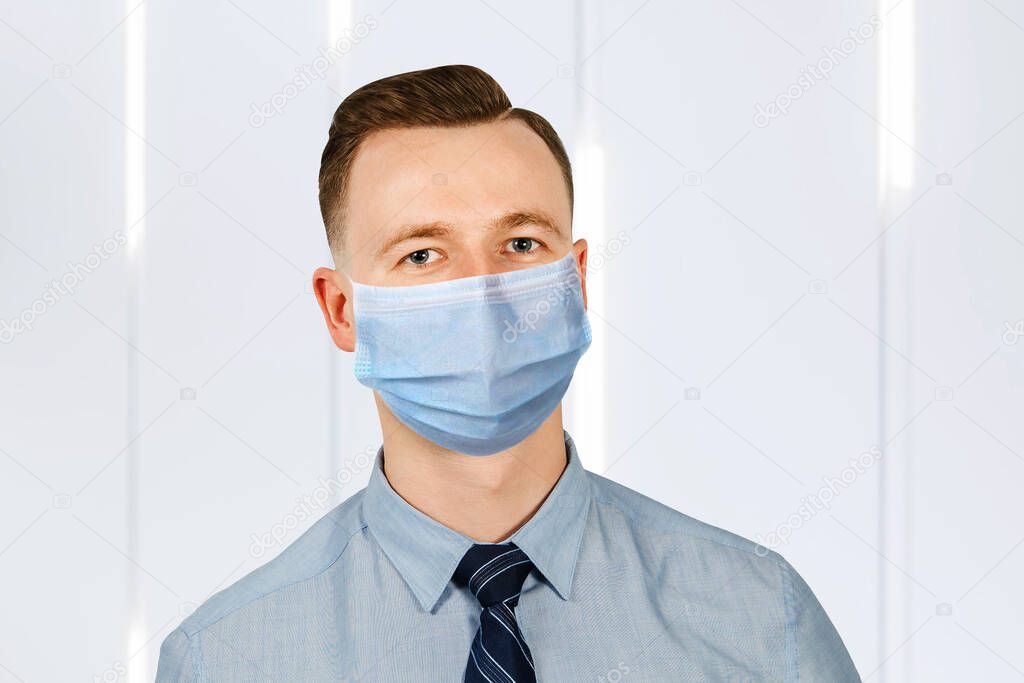 man in blue shirt and tie wearing a protective face mask prevent virus infection, pollution.
