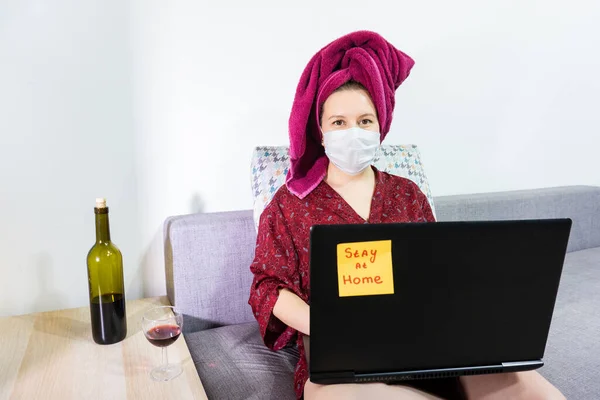 girl is working laptop from home room during Coronavirus or Covid-19 quarantine, coronavirus covid 19 infected patient.