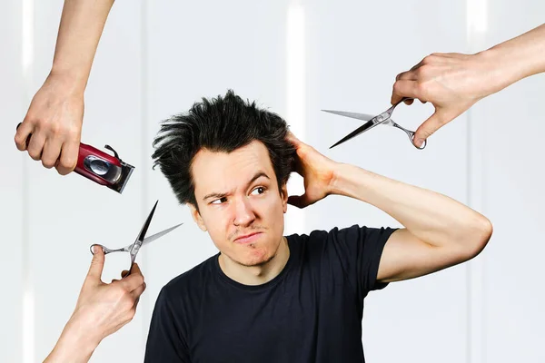 long hair freak crazy man hold scissors and trimmer and guy want cut his hair at home. Concept for barbershop.
