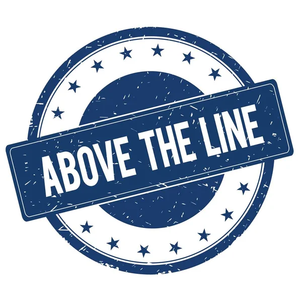 ABOVE THE LINE stamp sign — Stock Photo, Image