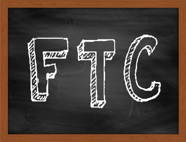 FTC handwriting text on black chalkboard — стоковое фото