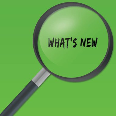 Yeşil arka plan üzerinde büyüteç altında yeni metin nedir.