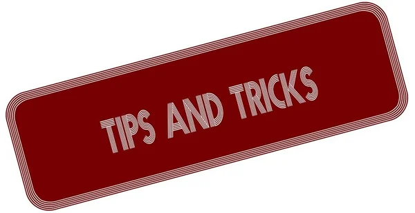 Tips en trucs op rode etiket. — Stockfoto